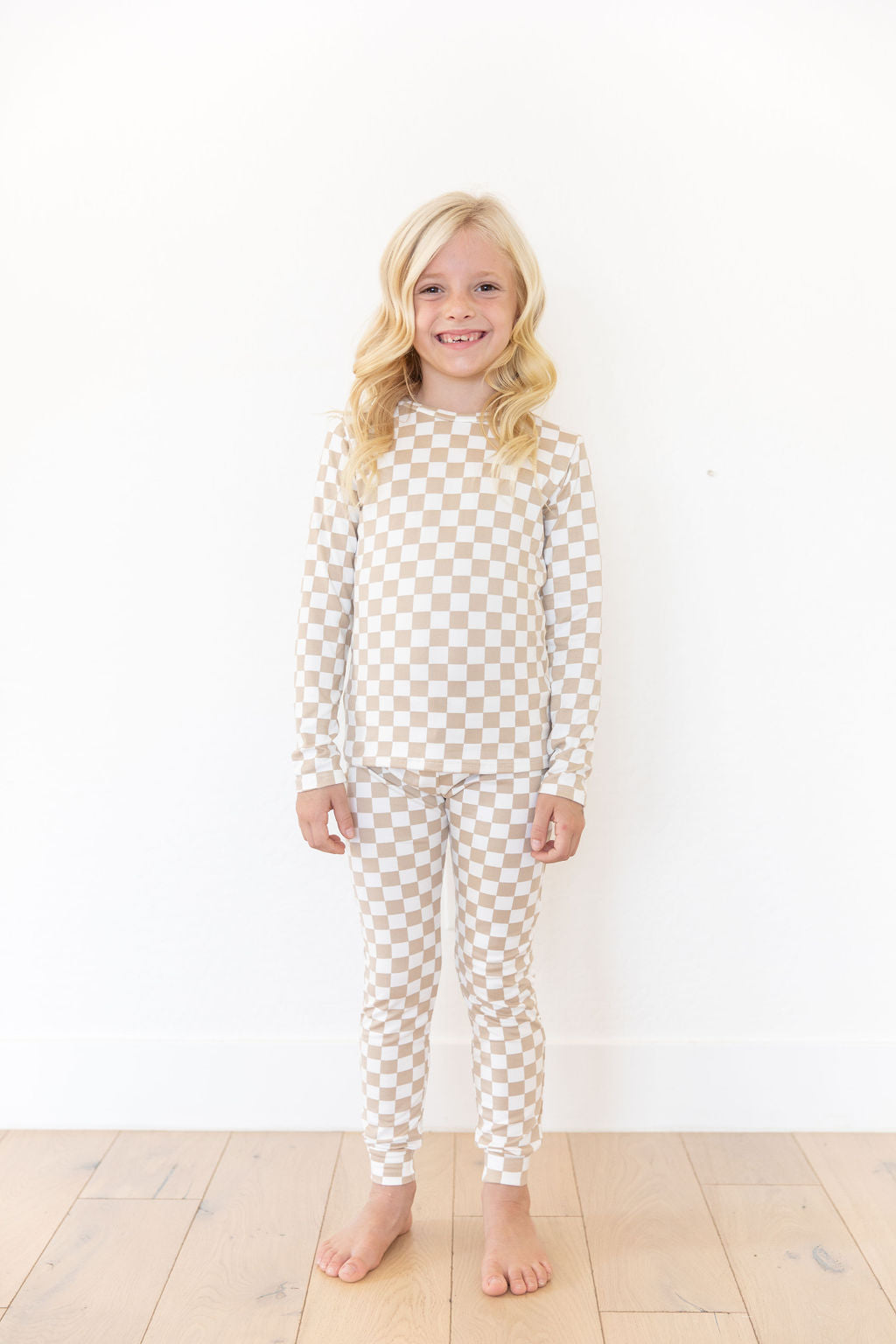 Young girl wearing pajamas, checker - OpenDream